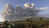 Indonesia’s Mount Sinabung volcano sprea...